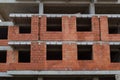 New building of a red brick multi-storey residential building. Background Royalty Free Stock Photo