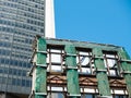 New building versus old building demolition Royalty Free Stock Photo