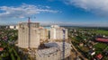 Industrial building site. skyscrapers under construction on clear blue sky background with two crane Royalty Free Stock Photo