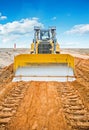 New bulldozzer on construction site Royalty Free Stock Photo
