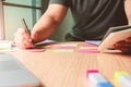 New. Business man holding pen meeting at home office and using notes paper share design planning ,brainstorming brainstorm idea on Royalty Free Stock Photo