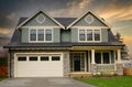 New Canadian Home House Exterior Dramatic Cloudy Cumulus Sky Background