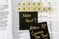 New Canadian personal tax forms and letter tiles showing refunds and taxes