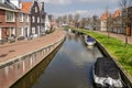 New canal with houses and sloops Royalty Free Stock Photo