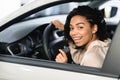 Lady Buyer Showing Auto Key Sitting In Automobile In Dealership