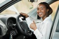 New car, portrait or happy black woman with thumbs up, yes or thank you for vehicle finance or loan success. Smile Royalty Free Stock Photo