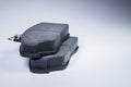 New car spare parts Brake pad set on a gray background