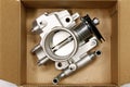 New car throttle valve in box Royalty Free Stock Photo