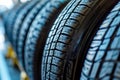 New car tires stacked in row. Royalty Free Stock Photo