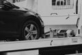 New car transported on tow track Royalty Free Stock Photo