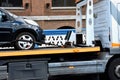 New car transported on tow track Royalty Free Stock Photo