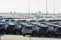 New cars parked at distribution center