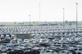 New cars parked at distribution center