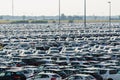 New cars parked at distribution center