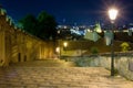 New castle stairs road leading up to Prague Castle Czech Republic enlightened by street lamps with a beautiful view over Prague