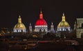 New Cathedral Domes in Cuenca, Ecuador are illuminated in the city flag colors for Independence Day, shown at night Royalty Free Stock Photo
