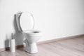 New ceramic toilet bowl in bathroom Royalty Free Stock Photo