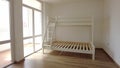 New children rooom with bunk bed. New home. Interior photography. Wooden floor.