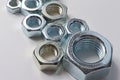 New chrome screw-nut of different sizes Royalty Free Stock Photo
