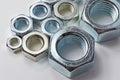 New chrome screw-nut of different sizes Royalty Free Stock Photo