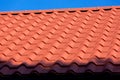 A new clean orange roof tiles. Royalty Free Stock Photo