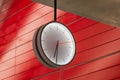 New clock in red back ground at new build Copenhagen metro station