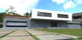 A new concrete building in an ancient area of a tropical city near the capital of Bali. Entrance to the garage with automatic Royalty Free Stock Photo