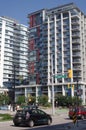 New condos in False Creek Village in Vancouver and growing population of homeless locals Royalty Free Stock Photo