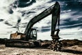 New construction bull dozer equipment breaking ground. Royalty Free Stock Photo