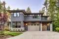 New construction home with wood and stone siding Royalty Free Stock Photo