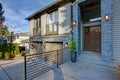 New construction home exterior with elegant stone porch Royalty Free Stock Photo