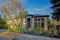 New construction home exterior with perfectly landscaped front yard