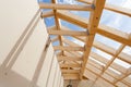 New construction home framing against blue sky, closeup of ceiling frame.with plasterboard wall Royalty Free Stock Photo