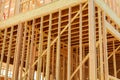 New home construction. build with wooden truss, post and beam framework. Royalty Free Stock Photo