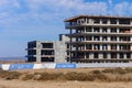 New construction progress at a beachfront resort site under a clear blue sky Royalty Free Stock Photo