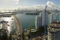 New construction site of developing residense in american urban area. Industrial tower lifting cranes in Miami, Florida