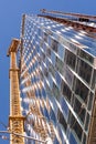 New Construction Skyscraper, Elevators and Reflections Royalty Free Stock Photo