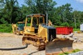 new construction tractor excavators and garbage containers