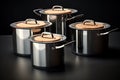New cooking pot set. Metal saucepans, soup kitchenware, shiny stainless cooking pots,