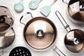 New cookware set and kitchen utensils on white wooden table, flat lay Royalty Free Stock Photo