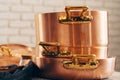 New copper cookware for professional kitchen close up Royalty Free Stock Photo