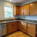 New countertops installed, backsplash partially up , stone, kitchen update, quartz Royalty Free Stock Photo