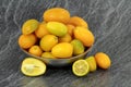 New crop, fresh kumquats in the metal bowl