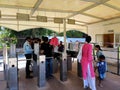 Group of People passing through a security counter during their travel and tourism activity.