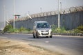 New Delhi, India - April 16, 2023 - View of Vehicles passing through the main road near Indra Gandhi International Airport Delhi