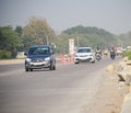 New Delhi, India - April 16, 2023 - View of Vehicles passing through the main road near Indra Gandhi International Airport Delhi