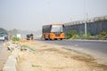 New Delhi, India - April 16, 2023 - View of Vehicles passing through the main road near Indra Gandhi International Airport Delhi