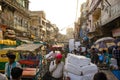 New Delhi, India - April 16, 2016 : Overcrowded street in old town with smog, dangerous electric lines and Jama masjid