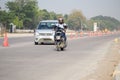 New Delhi, India - April 16, 2023 - View of Vehicles passing through the main road near Indra Gandhi International Airport Delhi