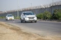 New Delhi, India - April 16, 2023 - View of Vehicles passing through the main road near Indra Gandhi International Airport Delhi